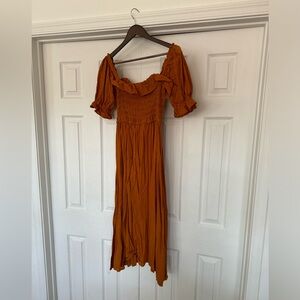 Rust colored women’s midi dress